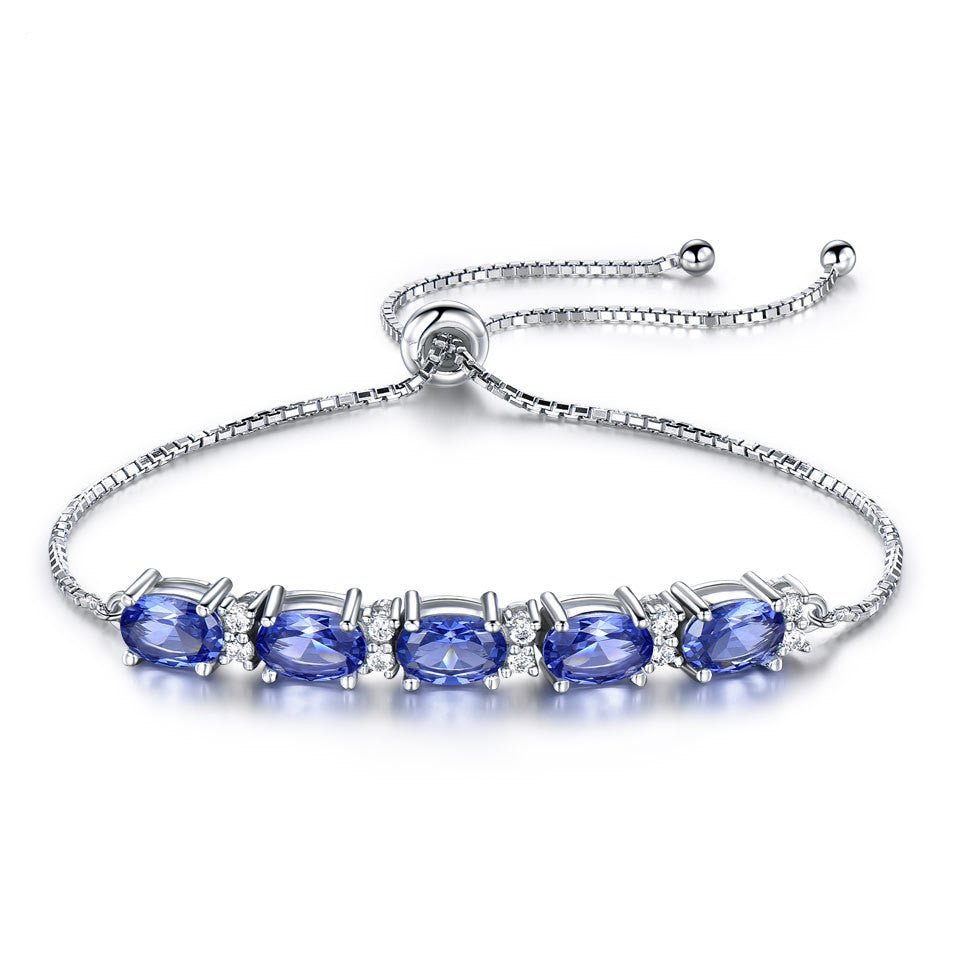 Sterling Silver Blue Sapphire Adjustable Pull Bracelet - Amyris London