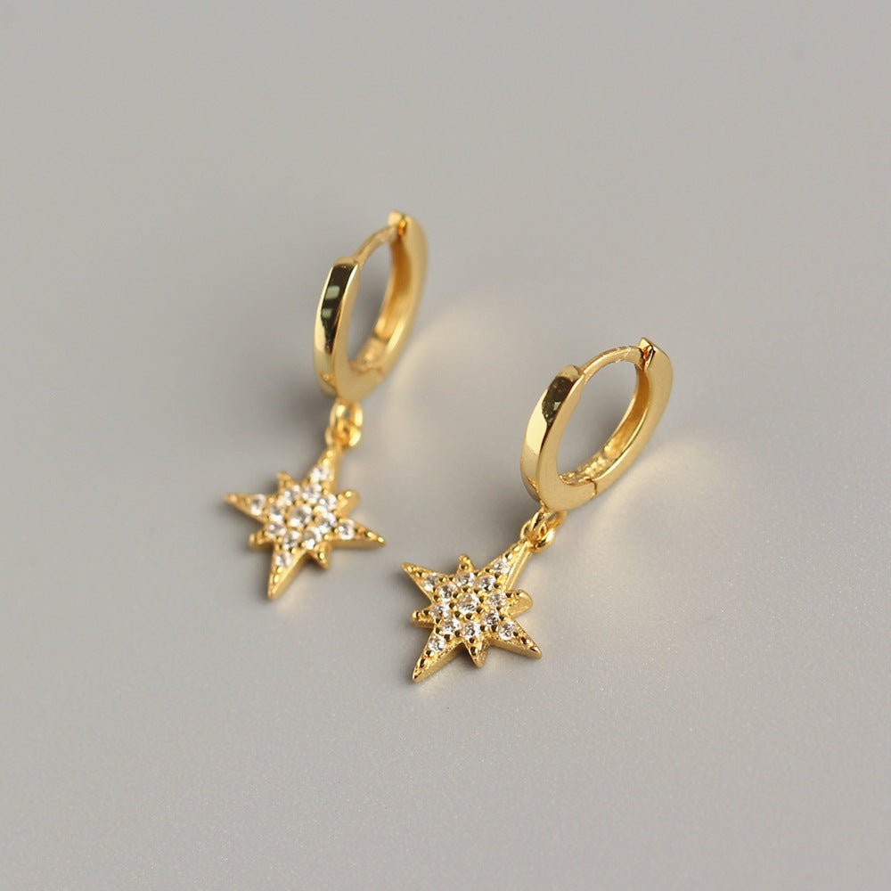 Sterling Silver Star Huggie Earrings - Amyris London